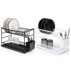 Black and white two-tier dish drainer racks holding plates, glasses and cutlery