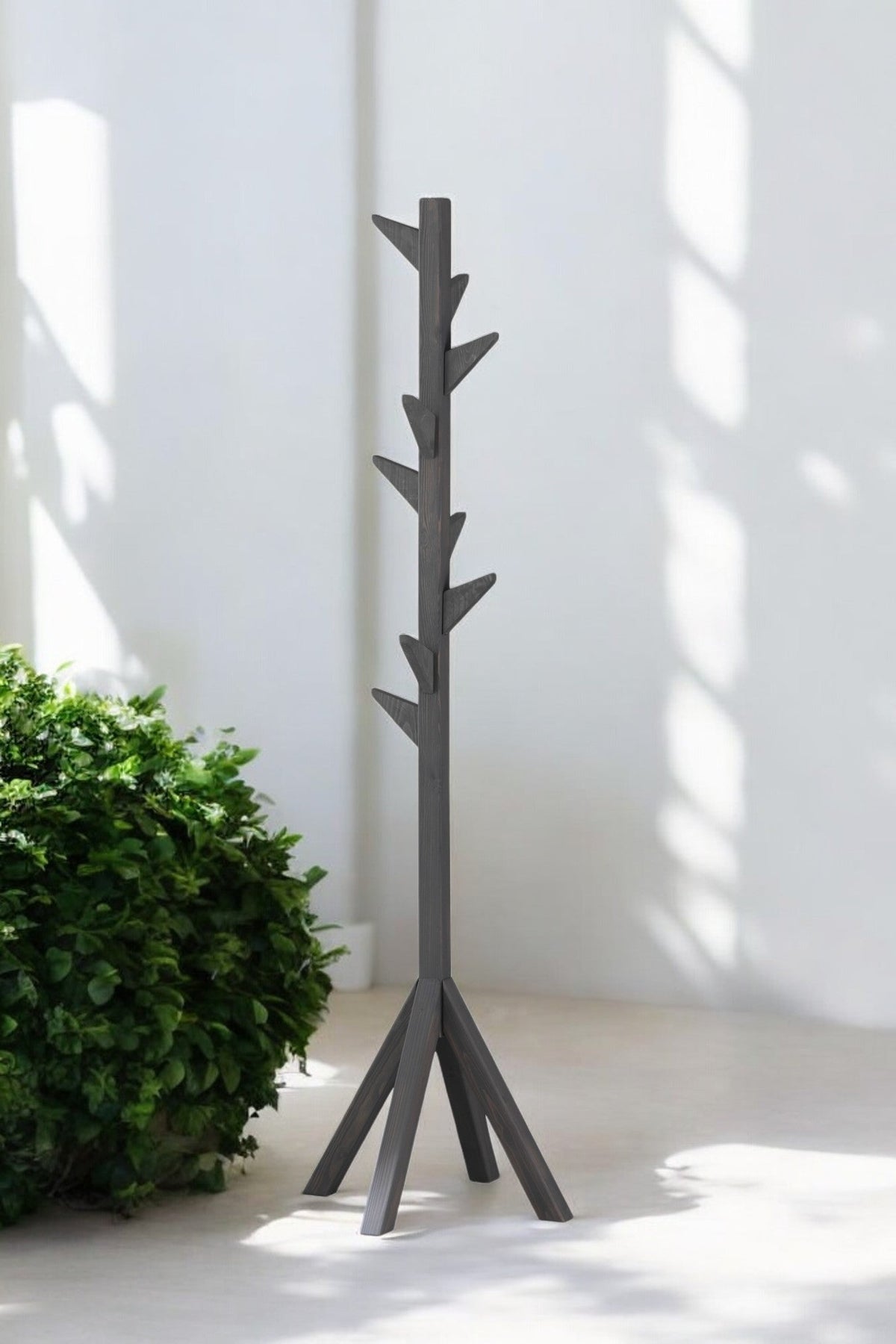 TheOwnas freestanding wooden coat rack in anthracite with 9 hooks for organized hallway storage